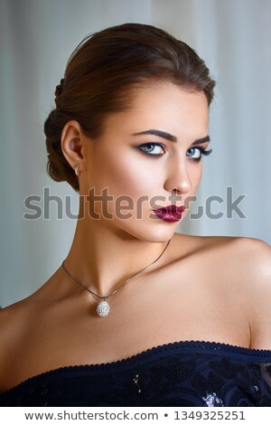 Foto d'archivio: Bridesmaid Portrait In Studio Attractive Young Woman With Perfect Make Up And Hair Style