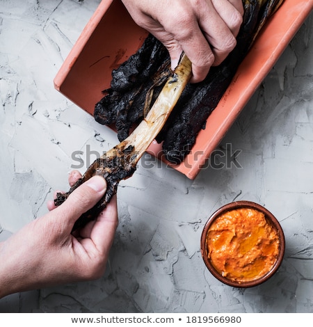 ストックフォト: Person With Calcots Onions Typical Of Catalonia