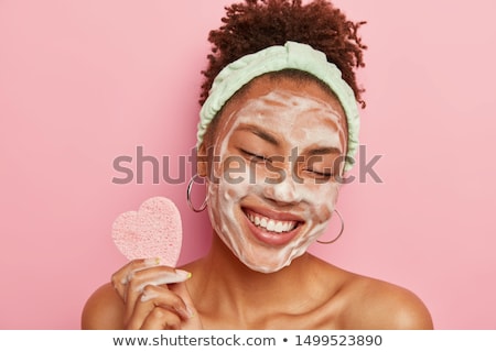 Stockfoto: Woman With Skin Cleansing Sponge