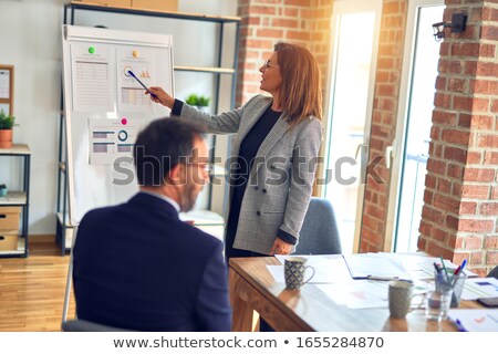 Stock photo: A Woman Doing A Presentation