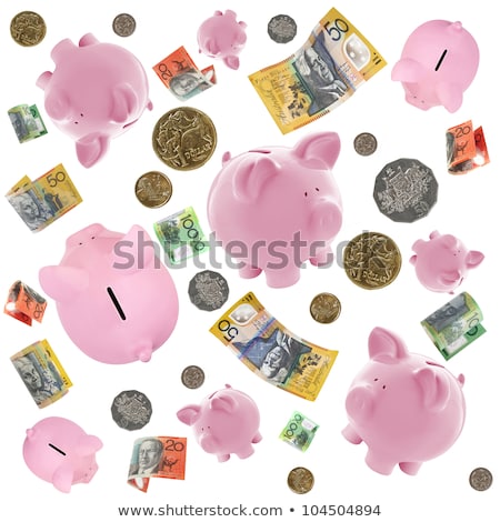 Foto stock: Piggy Banks And Australian Money Falling Over White