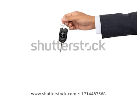 Foto stock: Male Hand Holding A Car Key New Car Concept