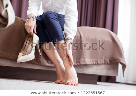 Foto stock: Beautiful Woman Touching Her Legs