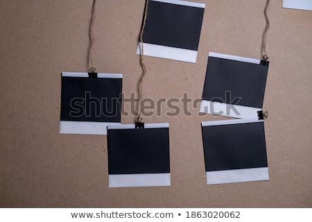 Stok fotoğraf: Empty Polaroid Photos Frames On Wood Background