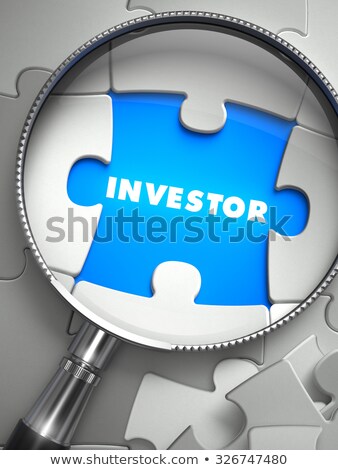 Stock fotó: Investor - Missing Puzzle Piece Through Magnifier