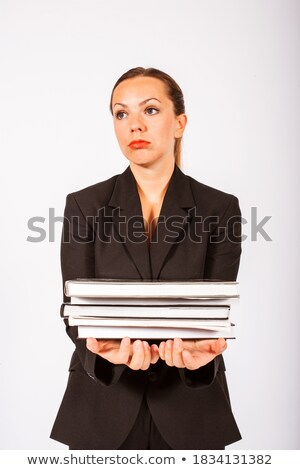 Zdjęcia stock: Tired Exhausted Woman Standing And Holding Stack Of Books