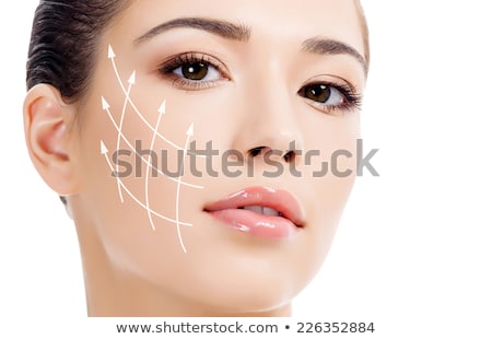 Foto stock: Beautiful Young Female With Clean Fresh Skin Abstract Backgroun