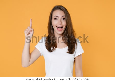 Stock photo: Image Of Young Woman 20s Wearing Casual Clothing Holding Fingers