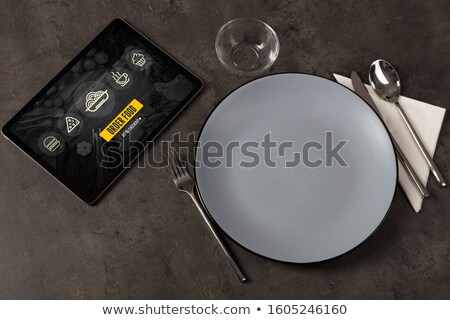 Stockfoto: Online Food Order Concept On Laid Table