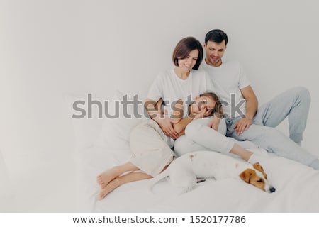 [[stock_photo]]: Photo Of Lovely Family Spend Free Time Together Stay In Bed For Long Time Had Healthy Sleep Pedig