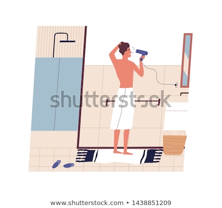Stockfoto: Man Drying Hair With Hairdryer At Home