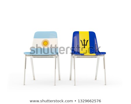 Stock fotó: Two Chairs With Flags Of Argentina And Barbados