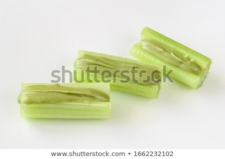 [[stock_photo]]: Celery Stalks With Pistachio Butter