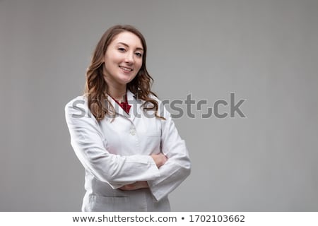 Thoughtful Middle Aged Doctor With Arms Folded Foto stock © Giulio_Fornasar