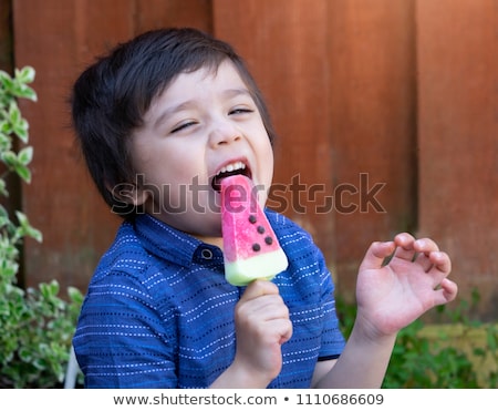 Stock fotó: Child Eating Healthy Fruit Popsicle