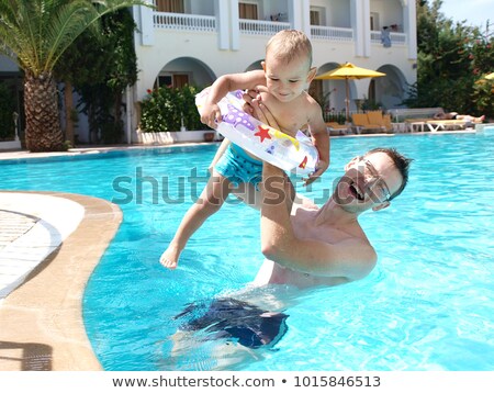 Stock photo: Man Under Pool Inflatable