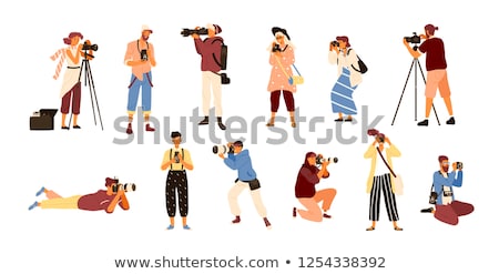 Foto stock: A Female Taking A Photo Of A Male