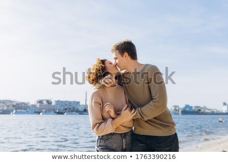 Stockfoto: Lovers Is Running With Hold Hands On Sea Beach