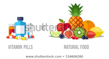 [[stock_photo]]: Medicine Pills Vs Healthy Apple