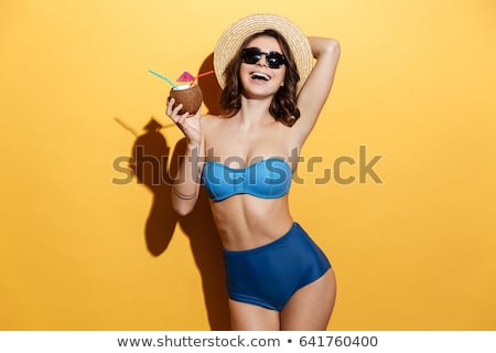 Stock fotó: Happy Young Woman In Swimsuit Drinking Cocktail