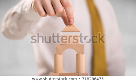 Stockfoto: Businessman Building A Tower