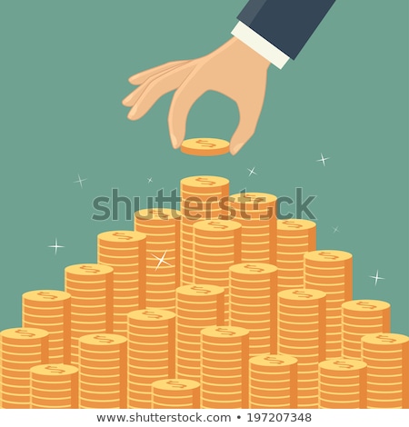 Stock photo: Hand Adding Coins To Stacks Of Money