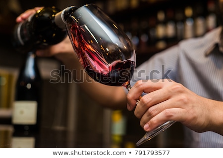 Foto d'archivio: Red Wine In Glass And Decanter