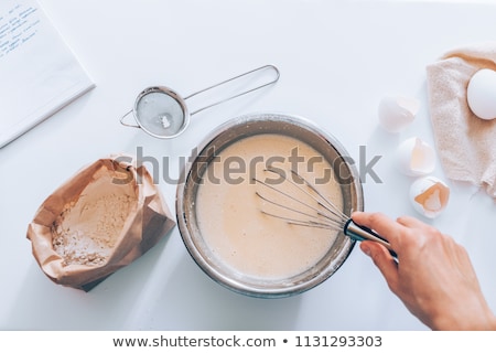 Stock photo: Woman Whisking Batter In A Bowl