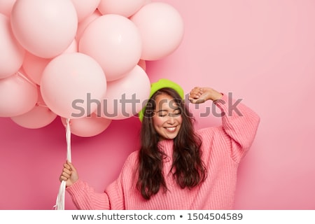 Stock photo: Teenagers Holding Helium Green Balloons