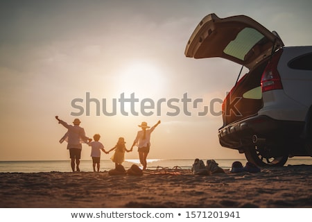 Foto d'archivio: Father Play Son Side Of The Beach