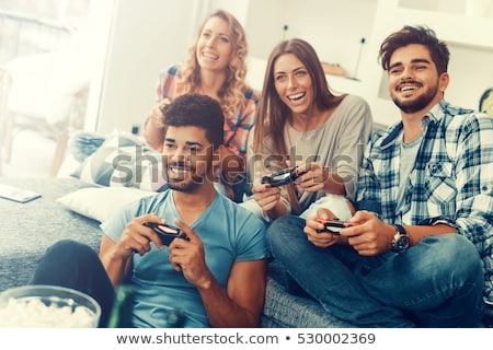 Сток-фото: Young Couple Playing Video Games