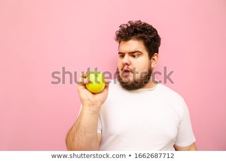 Stock fotó: Man With Oversized Apple On His Head