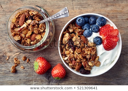 Stok fotoğraf: Yogurt With Homemade Granola And Strawberries