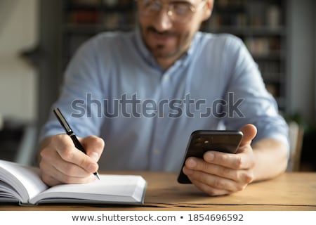 [[stock_photo]]: Calendar Planner And Man Creating Appointment