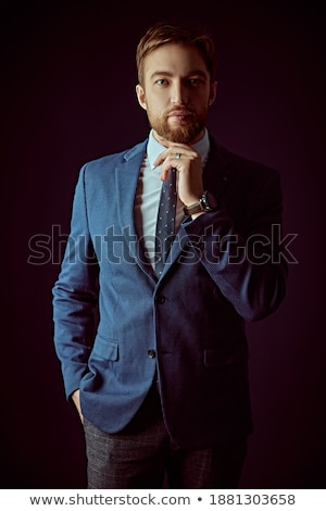 Foto d'archivio: Image Of Serious Businessman 30s In Black Jacket Looking At Came