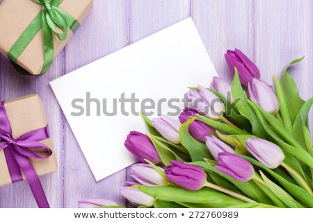 Сток-фото: Purple Tulips On Wooden Table