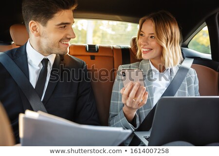 Zdjęcia stock: Image Of Young Businesslike Man And Woman In Formal Wear Sitting