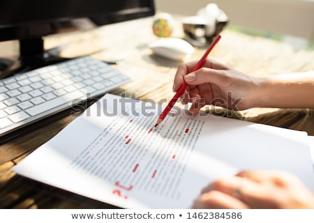 Foto stock: Correcting Spelling Mistake In Script