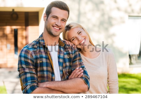 Stock photo: Young Couple In Each Others Arms