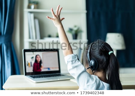 Zdjęcia stock: Girl Raising Hand