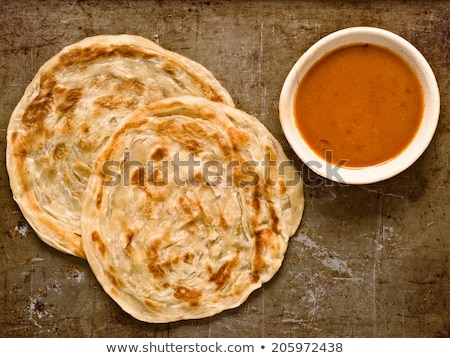 Stock fotó: Indian Roti Prata With Curry Sauce Closeup