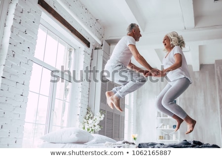 [[stock_photo]]: Senior Man Relaxing On Bed