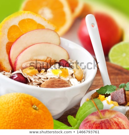 Stock photo: Dried Figs Oatmeal And Orange Juice Breakfast Setting
