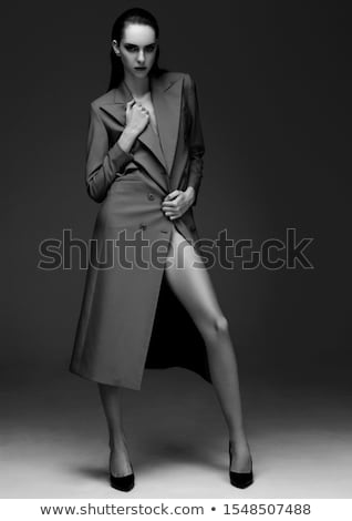 Fashion Model With Wet Hair Wearing Grey Coat Foto stock © DenisMArt