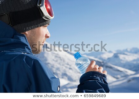 Zdjęcia stock: Snowboarder With Water Bottle Side View