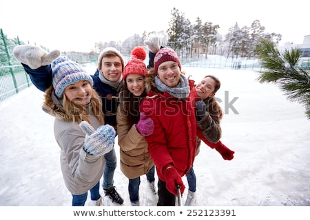 Stockfoto: Happy Woman With Selfie Stick Outdoors In Winter