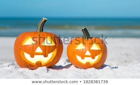 Foto stock: Pumpkins Lanterns On Turquoise Background