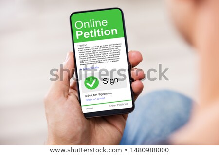 ストックフォト: Sign Online Petition On Smartphone