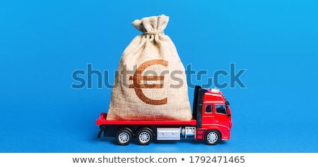 Foto stock: The Truck Is Carrying A Huge Euro Money Bag Great Investment Anti Crisis Measures Of Government A