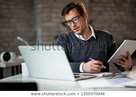 Foto stock: Businessman Reading Notes